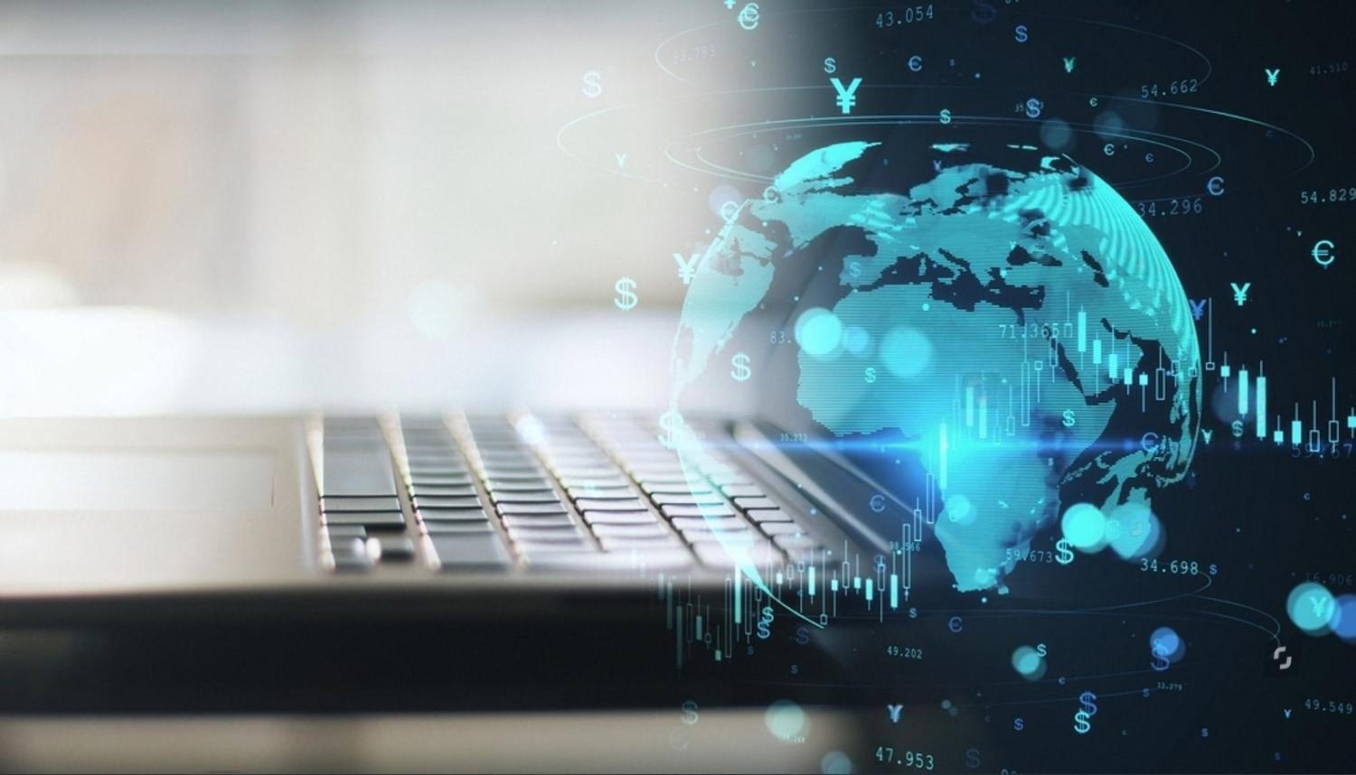 Laptop with a digital globe and financial data, illustrating due diligence on a foreign company